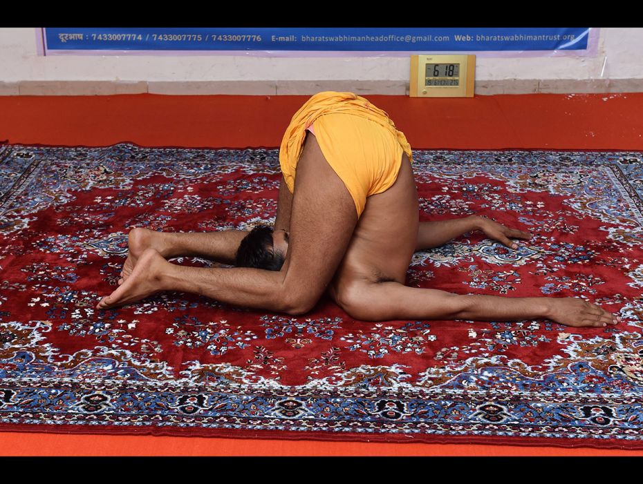 Yoga teacher Mahesh Yogiji attempting a world record for the longest yoga session in Ahmedabad, ahea