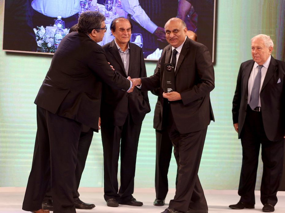 Hari Mohan Bangur, managing director of Shree Cement, accepts the Entrepreneur for the Year Award fr