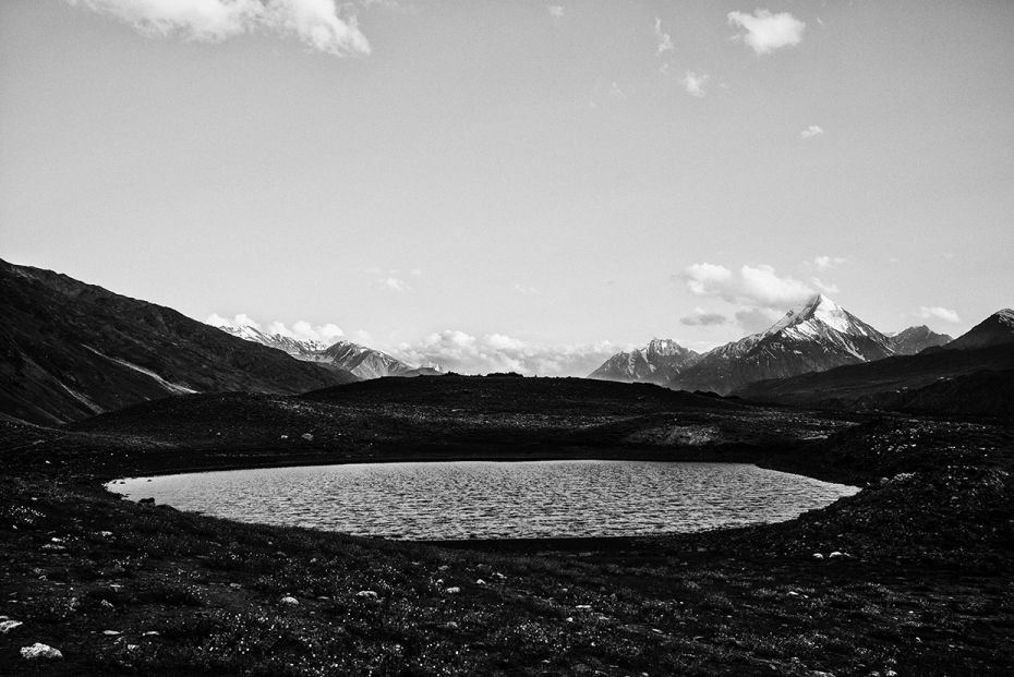 Small pond of glacial water at the height of around 14,000 fts near Chandra Taal Lake in Himachal Pr