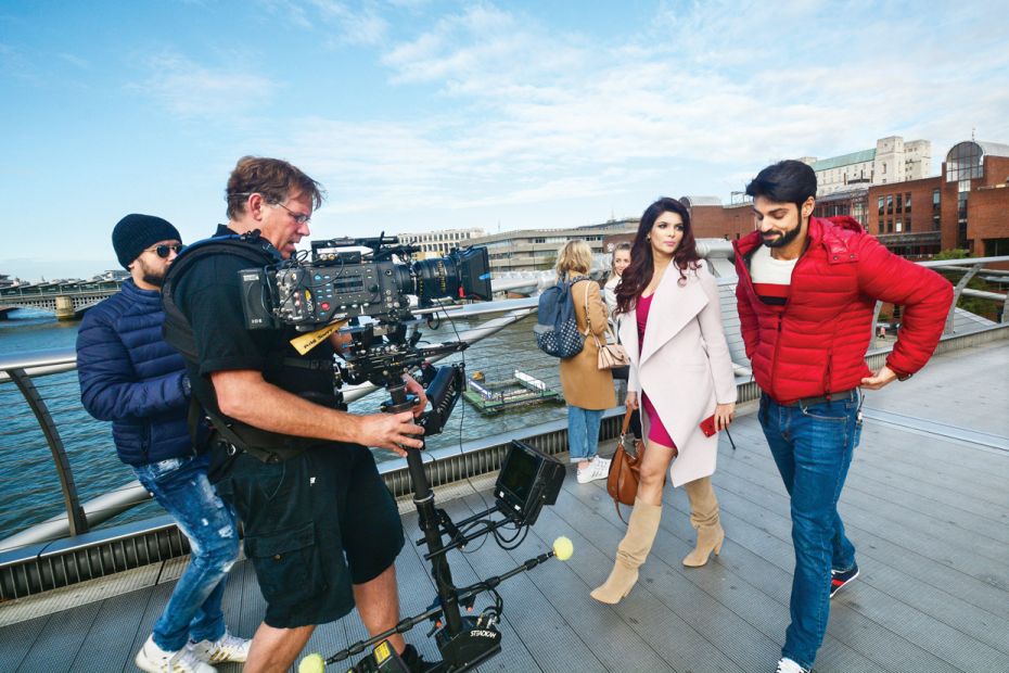 Foreign touchFreelance Steadicam operator Mike Scott shoots a scene with actors Ihana Dhil- lon and 