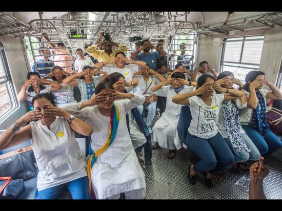 It was a yoga course on the move for locals on the 10.03 local to Virar on World Yoga Day . Alightin