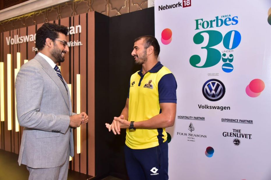 Abhishek Bachchan with India's kabaddi team captain, Ajay Thakur, at the Forbes India 30 Under 30 so