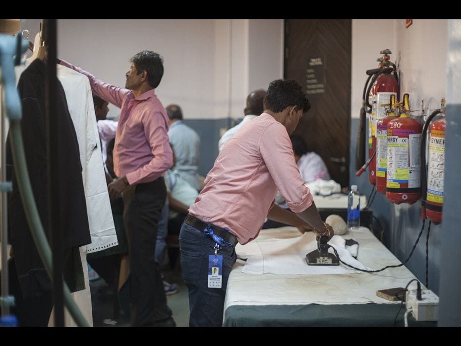 A team puts the final touches before the show, ironing out the details