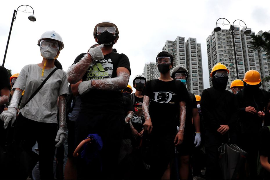 July 14, 2019: Protesters in Hong Kong wearing helmets as a silent form of protest. They started wea