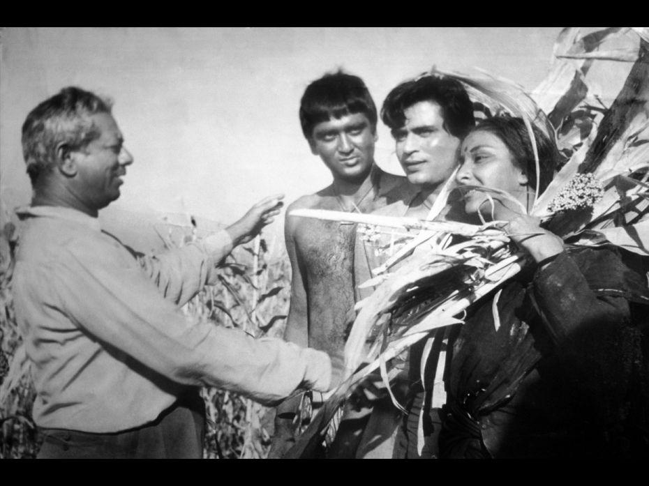 Director Mehboob Khan (extreme left) on the set of his film Mother India, with his actors Sunil Dutt