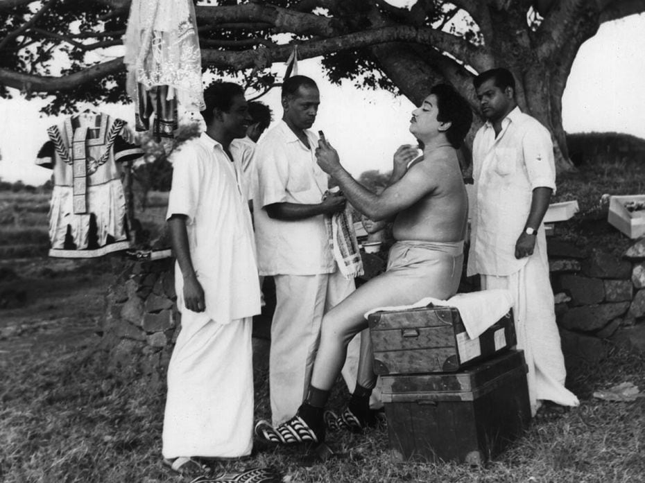 Actor Shivaji Ganesan is in the midst of applying makeup for his 1958 mythological film  Kathav