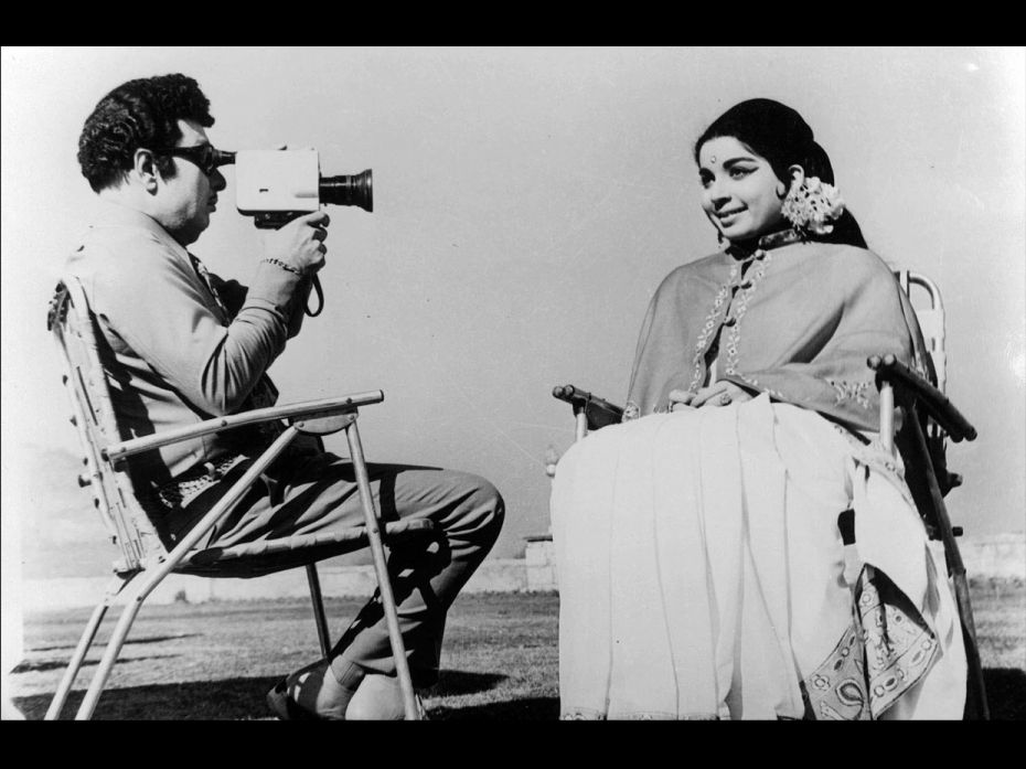 Actor-politician MG Ramachandran captures his co-star J Jayalithaa on camera in between shots of the