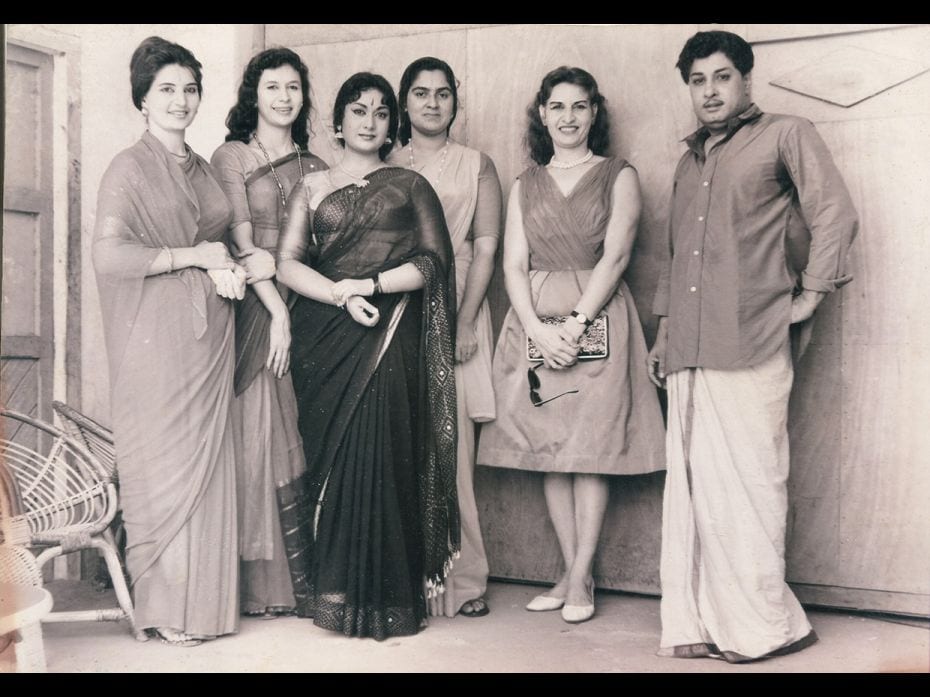 (From left) Actors MG Ramachandran and Savitri Ganesan (third from left) pose with fans during a fil