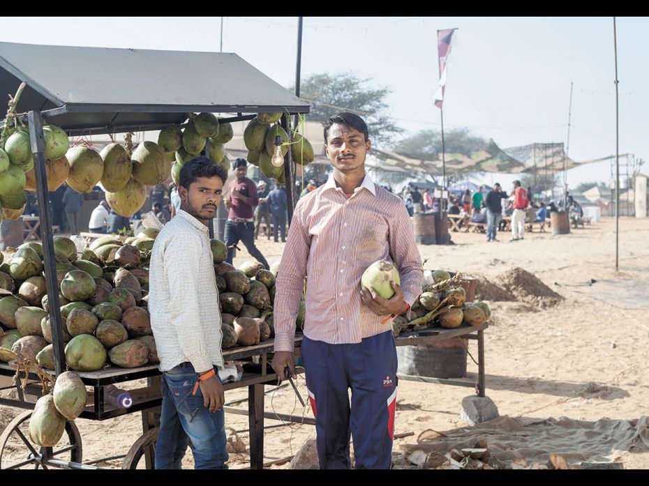 Raju and SamshuddhiAge: 22, 20Tender coconut sellerRaju sells tender coconut water in Jaipur all yea