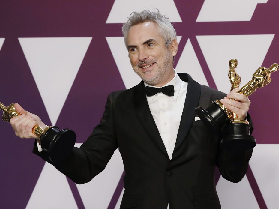 Alfonso Cuarón of Mexico wins Best Director, Best Foreign Language Film and Best Cinematograp