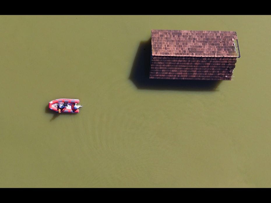 An aerial photo shows a submerged Hatay, Turkey, on January 18, 2019, as people are forced to use bo