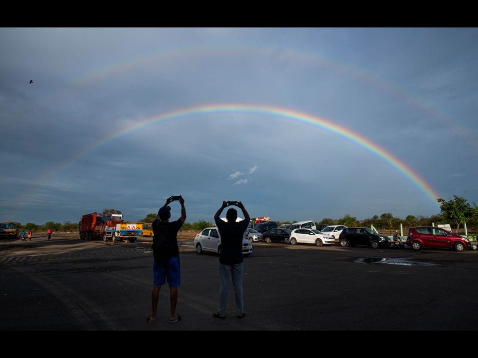 A rainbow stretches over Airoli after showers, on June 12, 2019 in Mumbai.