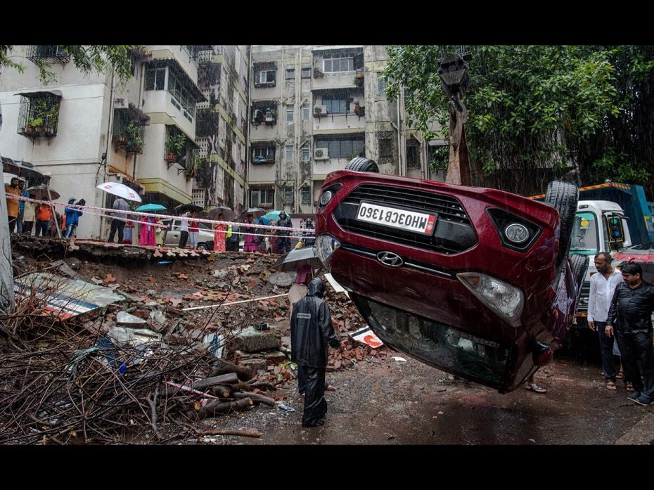 A compound wall of housing society collapsed on 5-6 cars at Ekveera Darshan society at Asalpha, on J