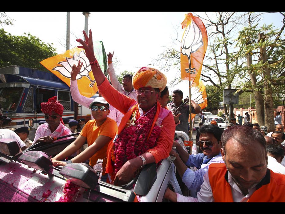 Kirit Solanki celebrates in Ahmedabad after defeating Congress's Raju Parmar by 3,21,546 votes. 