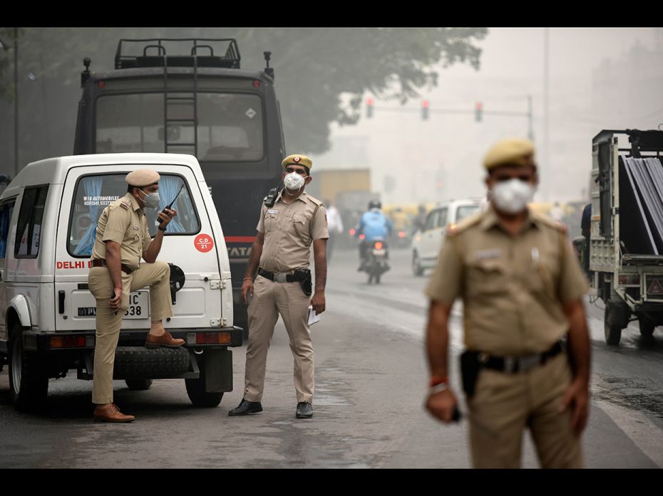 NEW DELHI, NOVEMBER 2: Those who work outdoors are among the worst-hit. Here, Delhi policemen are se