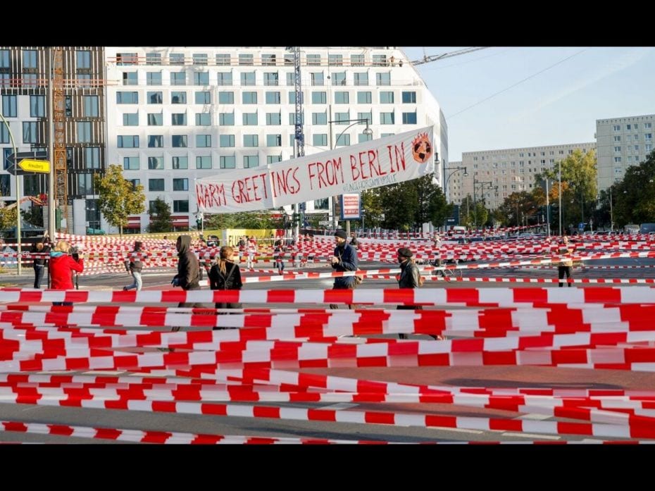 Climate activists block for road traffic Jannowitz Bridge in Berlin with hundreds of plastic cordons