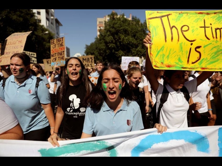 Students shout slogans during a global climate change strike in Nicosia, Cyprus.