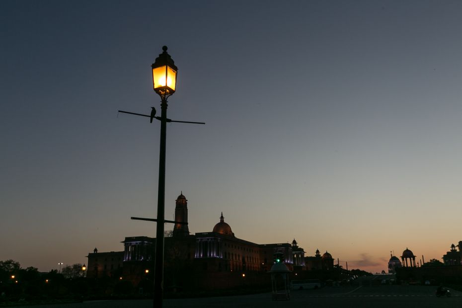 A crow, considered a vehicle of the God of Death in mythology, at dusk overlooking the Raisina Hill.