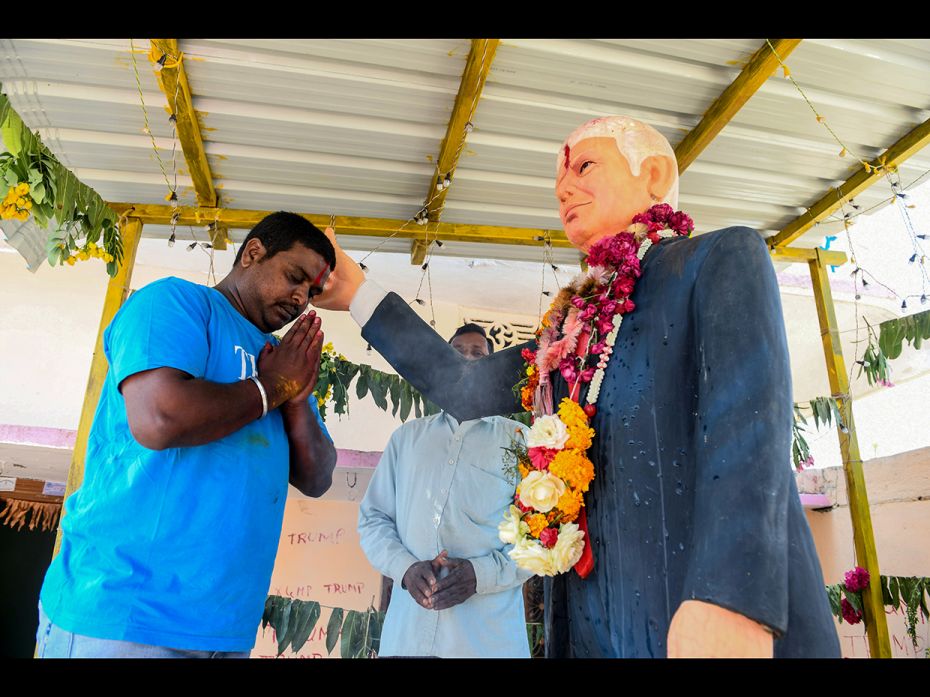 In this photo taken on February 17, 2020, farmer Bussa Krishna (L), 33, offers special prayers to th