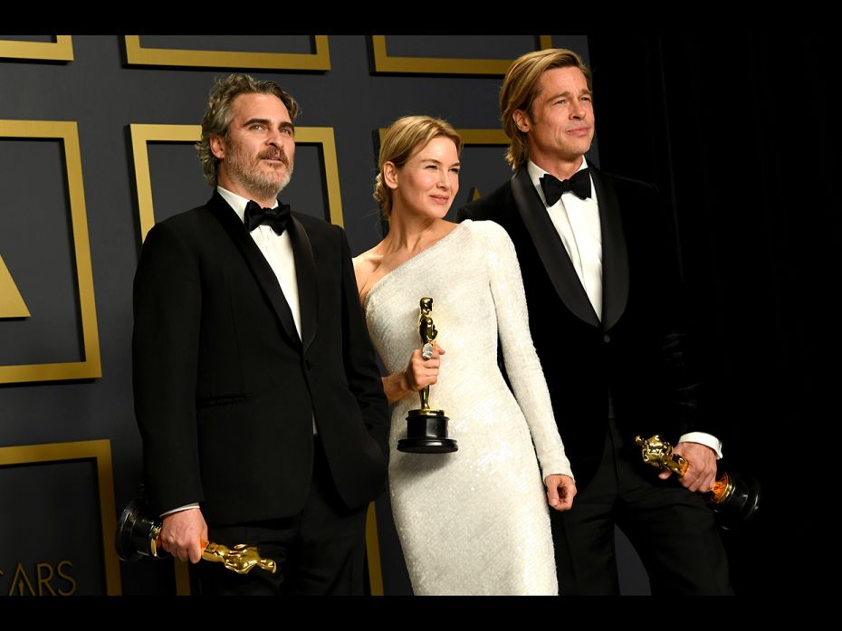 Joaquin Phoenix, winner of the Best Actor; Renee Zelleweger, winner of Best Actress; and Brad Pitt, 