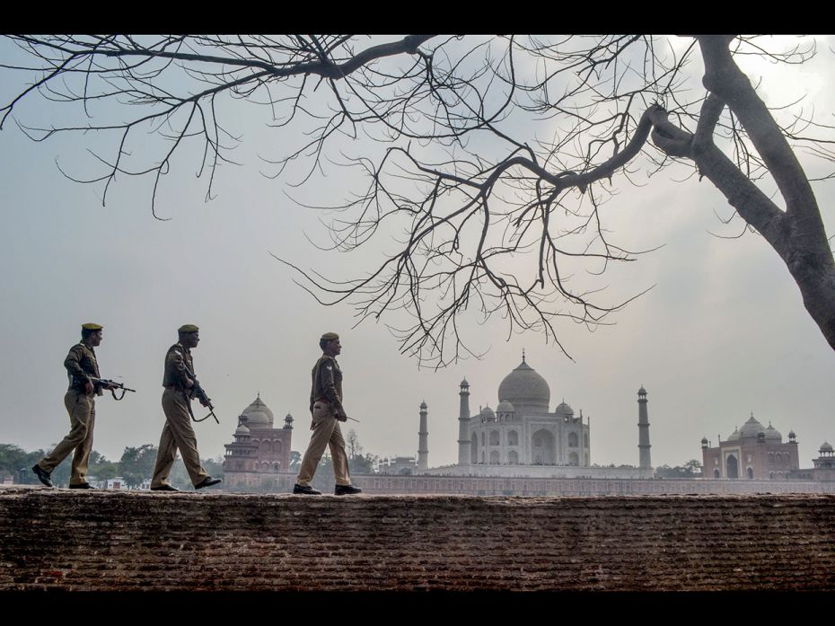 Security personnel patrol walked on a wall of the Mehtab Bagh, a garden complex lying north of the T