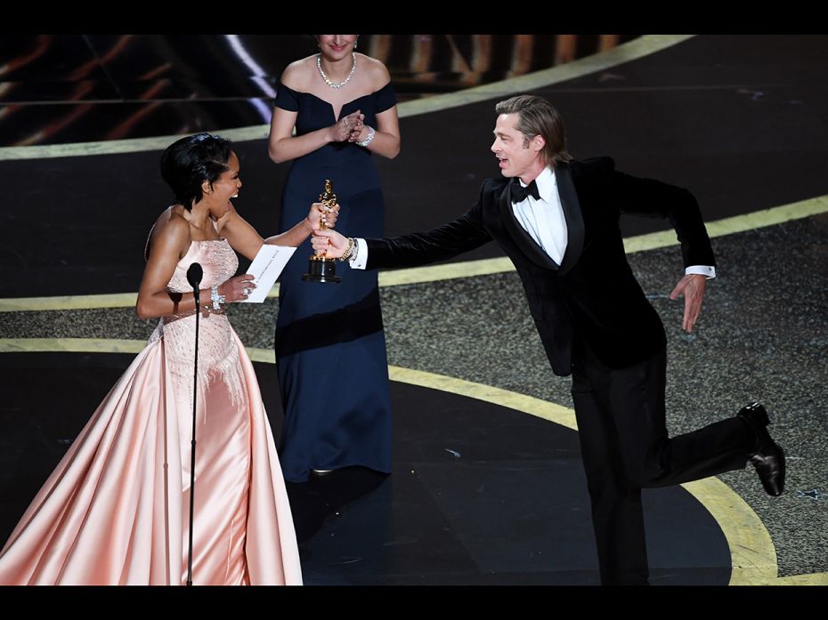 (L-R) Regina King presents the Actor in a Supporting Role award for 'Once Upon a Time...in Hollywood