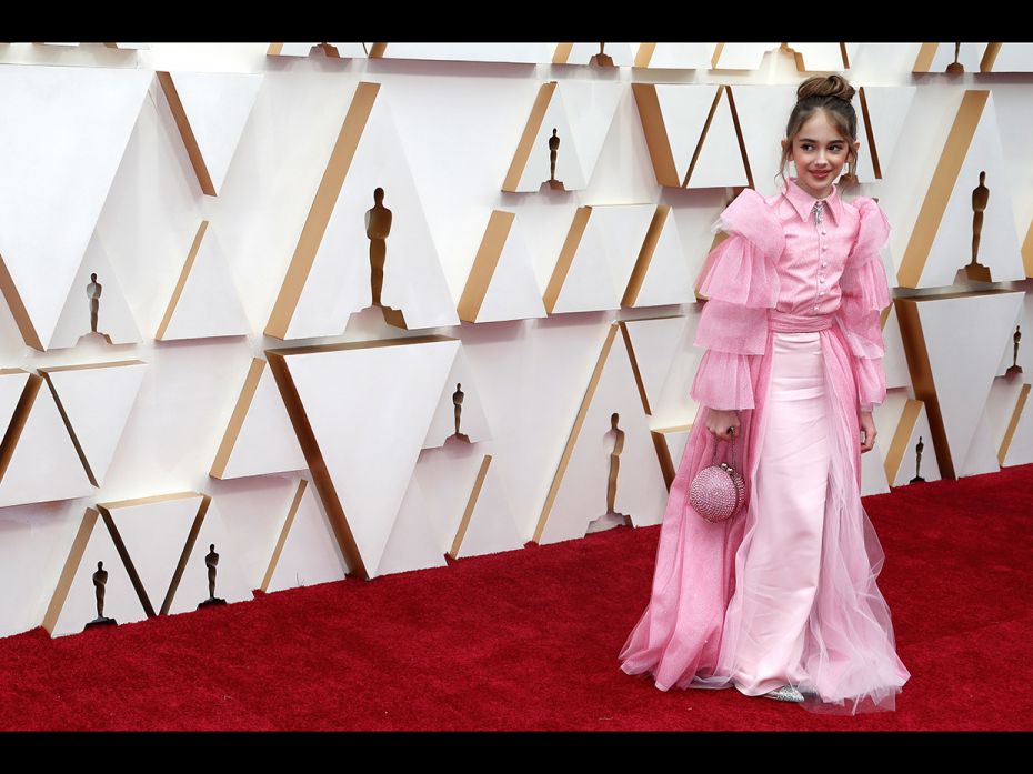 Ten-year-old actress Julia Butters in Christian Siriano on the red carpet during the Oscars arrivals