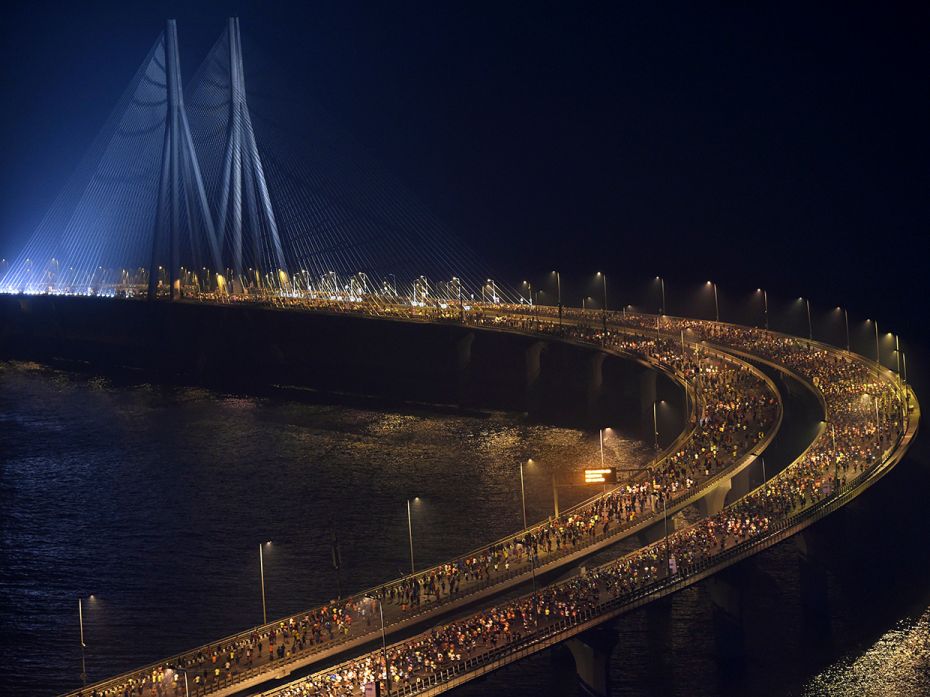 Participants get an early start on the Bandra-Worli sea-link, for the Tata Mumbai Marathon in Mumbai