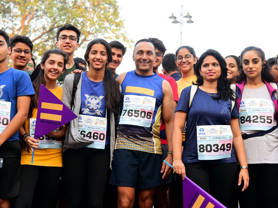 Bollywood actor Rahul Bose (C) participates with students in the Tata Mumbai Marathon in Mumbai on J