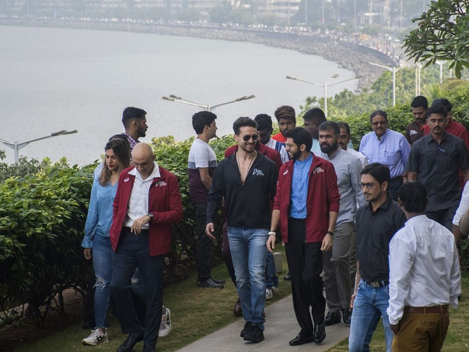 Bollywood actor Tiger Shroff with Maharashtra Tourism Minister Aaditya Thackeray during an event org