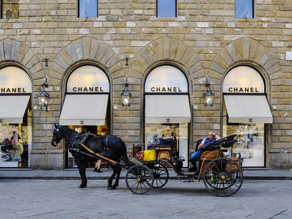 FLORENCE, ITALY - JUNE 3:  A horse carriage stands in an almost empty Piazza della Signoria wai