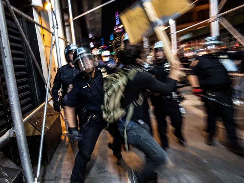 NEW YORK, NEW YORK - MAY 31: Protesters face off with New York City Police during a march to honour 