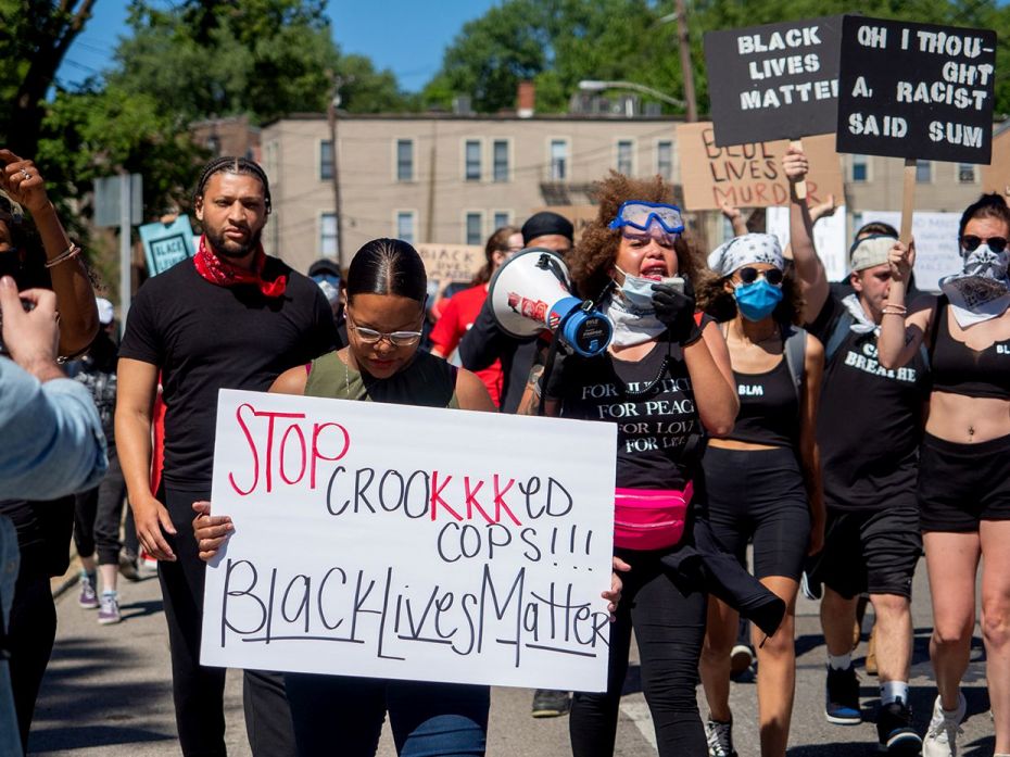 CINCINNATI, OH – May 31: Demonstrators march during a protest of the death of George Floyd, Su