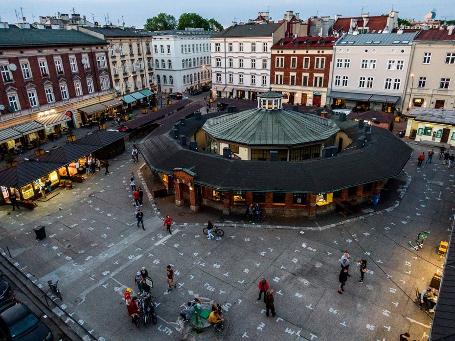 KRAKOW, POLAND - JUNE 3: An aerial view of people at the famous nightlife spot Nowy Square (Plac now