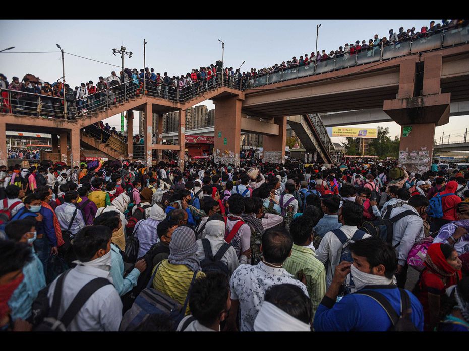 A huge rush of migrant workers who had been marching to their homes, seen at Anand Vihar Bus Termina