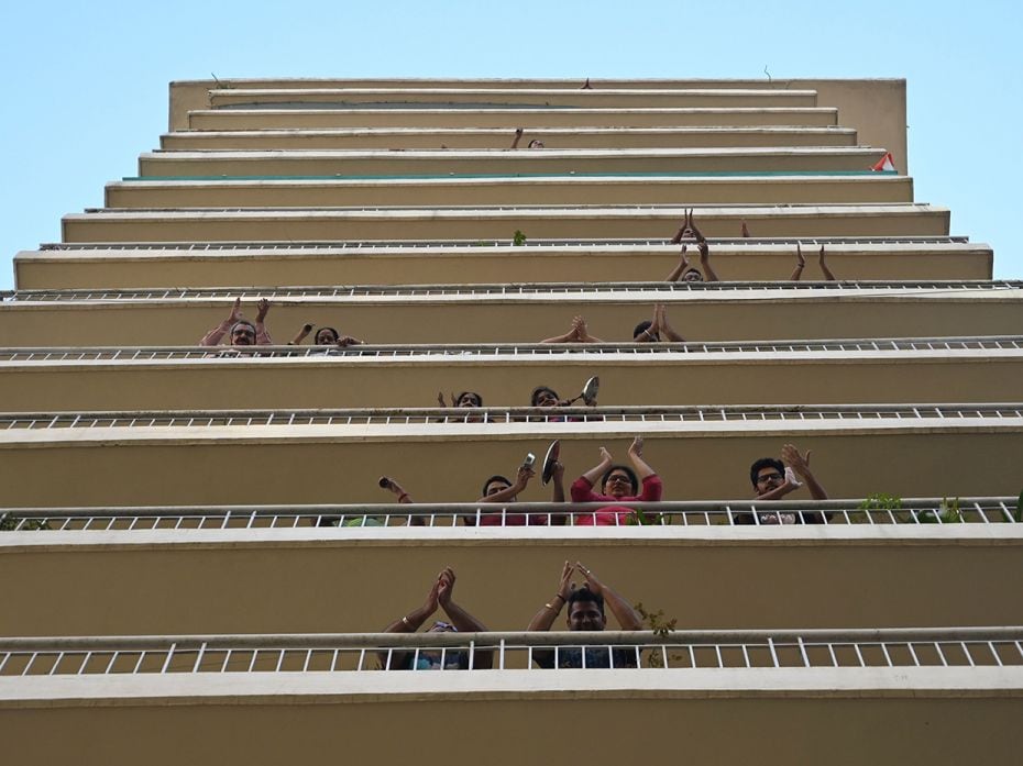 GURGAON: People gather in balconies of a residential building to clap and make noise with kitchenwar