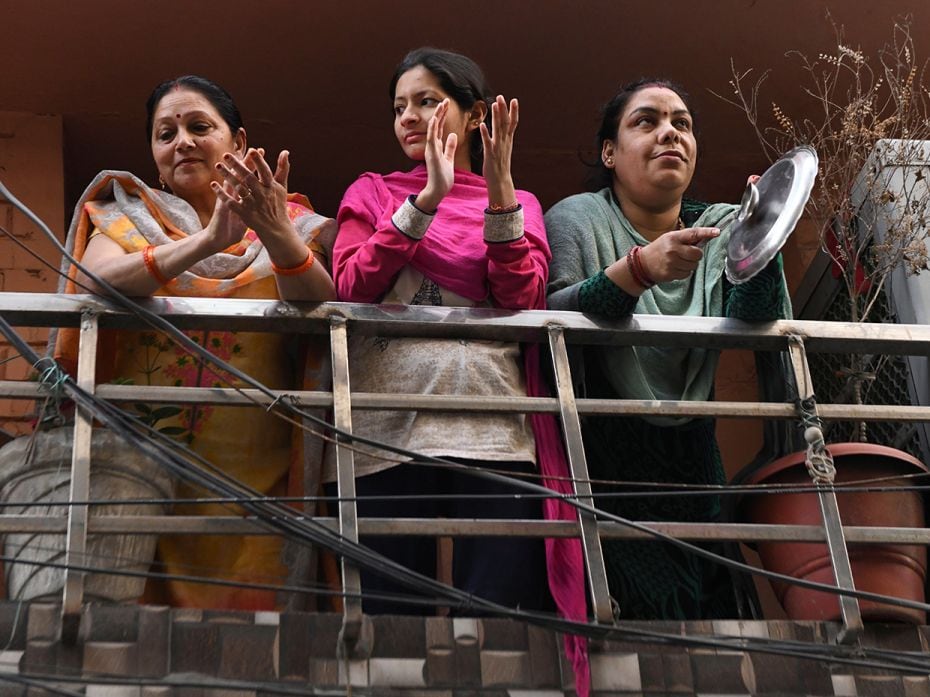 AMRITSAR: People gather in a balcony of a residential building to thank essential service