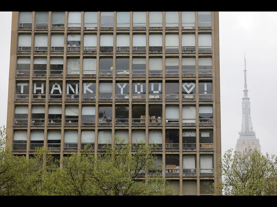 A thank you sign is posted in a building facing NYU Langone Health on National Nurse Day during the 