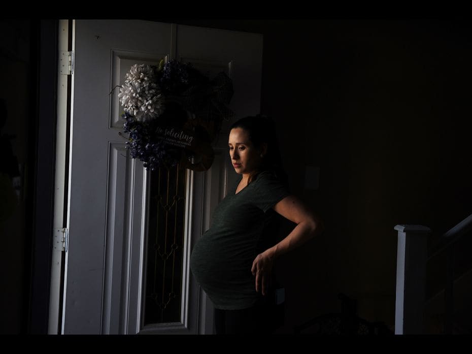 A heavily pregnant nurse continues working at a hospital in San Antonio, despite coronavirus fears. 