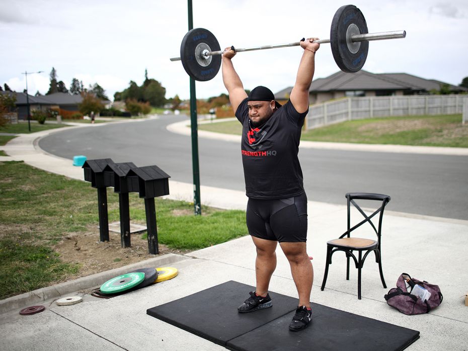 New Zealand weightlifter David Liti trains on his driveway at Te Kauwhata in April, when his country