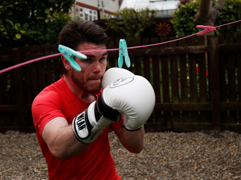 Pugilist Tommy Ward trains at his brother’s garden at Rainton in the UK. The boxer’s cra