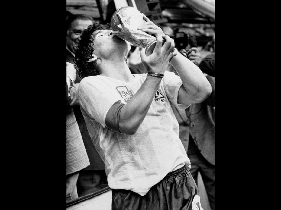 Maradona kisses the World Cup trophy after being presented it June 29, 1994. Argentina defeated West