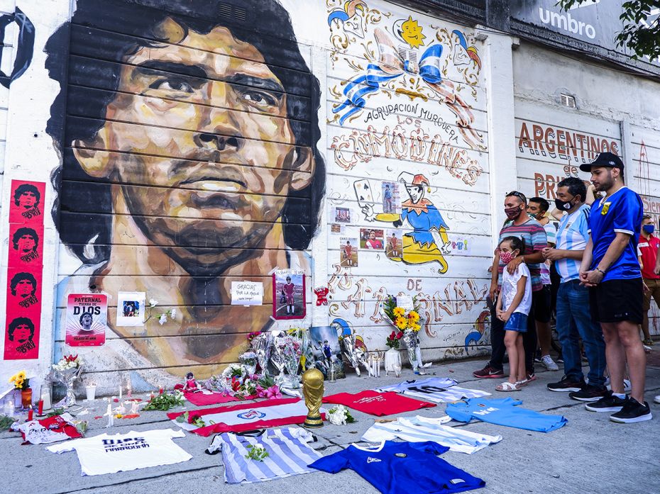 Fans mourn Diego Maradona in an altar outside Argentinos Juniors' Diego Maradona Stadium on November