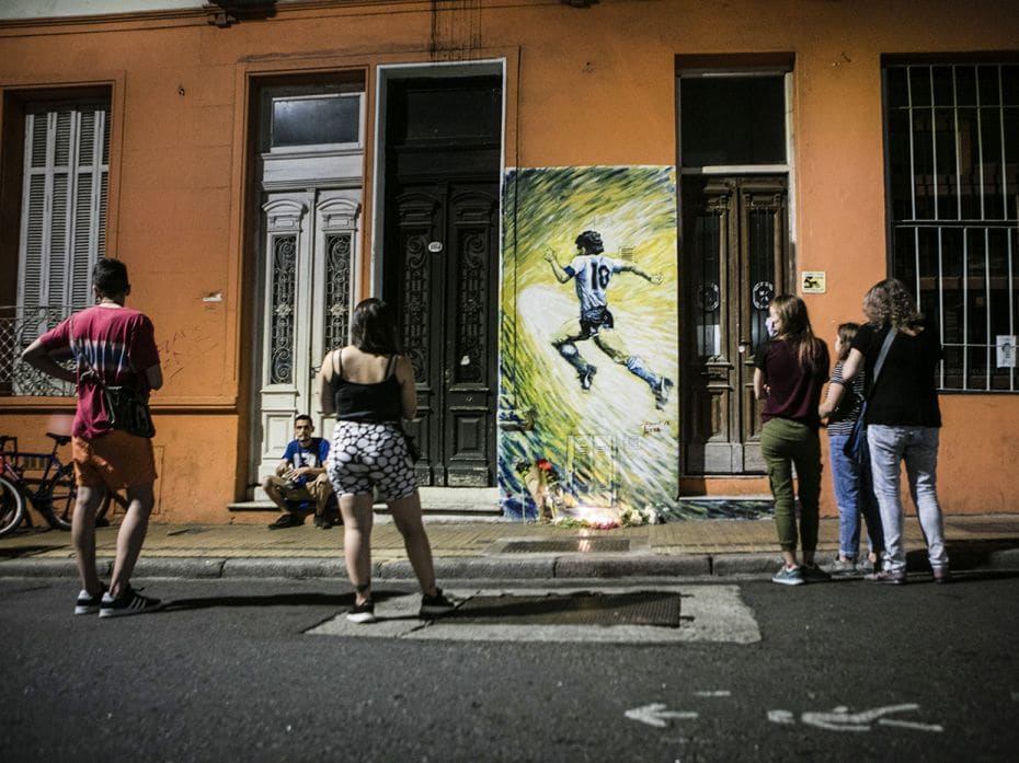 Fans pay tribute to Diego Maradona the former football star who died today, at San Telmo neighborhoo