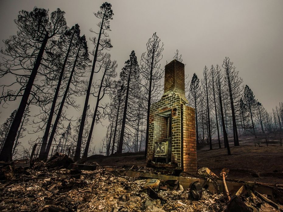 FRESNO COUNTY, CA - SEPTEMBER 08: The smoldering remains of a structure  along Auberry Road, where C