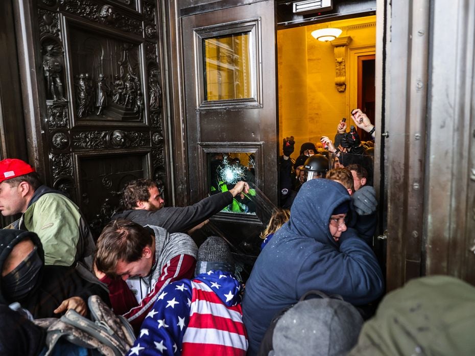 Protesters attempt to enter the US Capitol Building on January 06, 2021 in Washington, DC. Pro-Trump