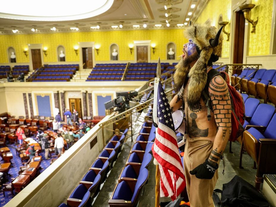 A protester yells inside the Senate Chamber on January 6, 2021 in Washington, DC.