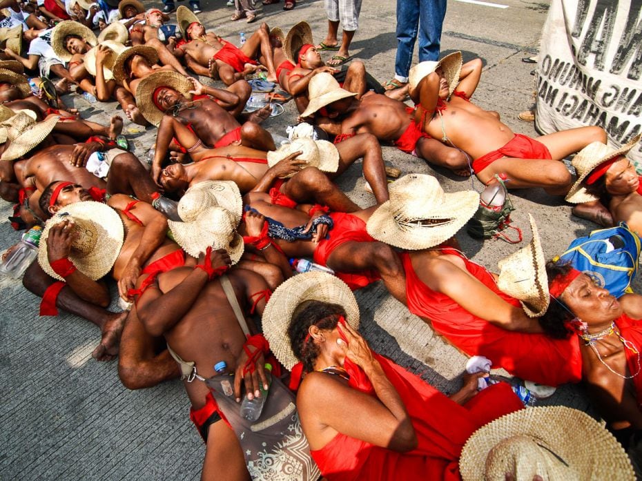 PHILIPPINES, 2012
Indigenous farmers and fishermen stage a 'die-in' protest to dramatise their plig