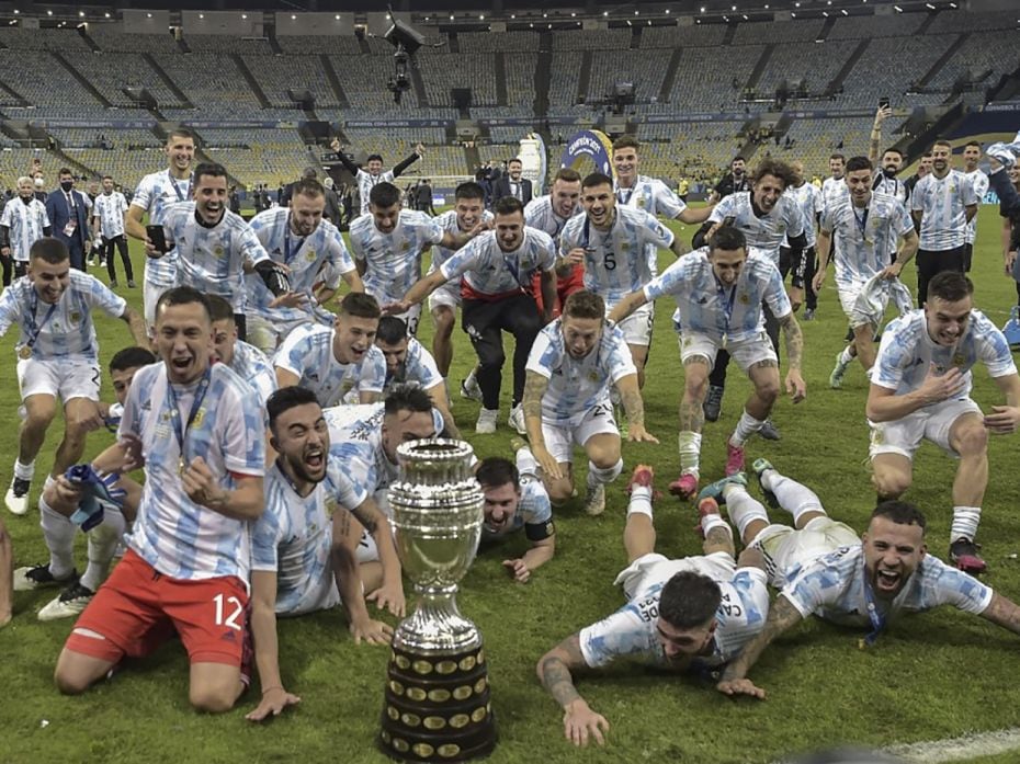 Players of Argentina celebrate with the trophy after winning the Conmebol 2021 Copa America football