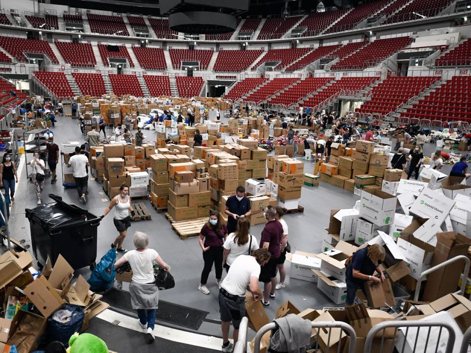 Germany
Volunteers pack boxes of relief goods for flood victims in the PSD Dome at North Rhine-West